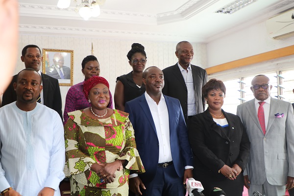 Isaac Asiamah (middle) with some members of the committee after the inauguration